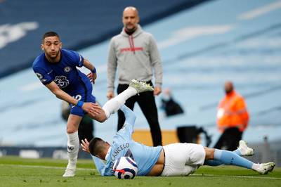 Chelsea attacker Hakim Ziyech skips past a challenge by Joao Cancelo of City. Getty