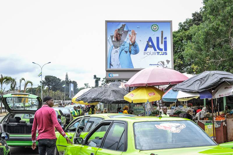 A torn campaign poster in Libreville for ousted Gabon President Ali Bongo. AFP