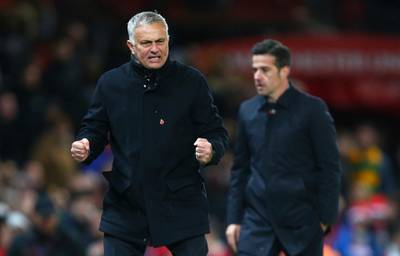 Manchester United manager Jose Mourinho reacts, next to Everton manager Marco Silva, right, during the last minutes of the match. AP Photo