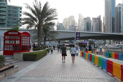 DUBAI, UNITED ARAB EMIRATES , October 12 – 2020 :- View of the marina walk in Dubai Marina in Dubai. (Pawan Singh / The National) For Stock