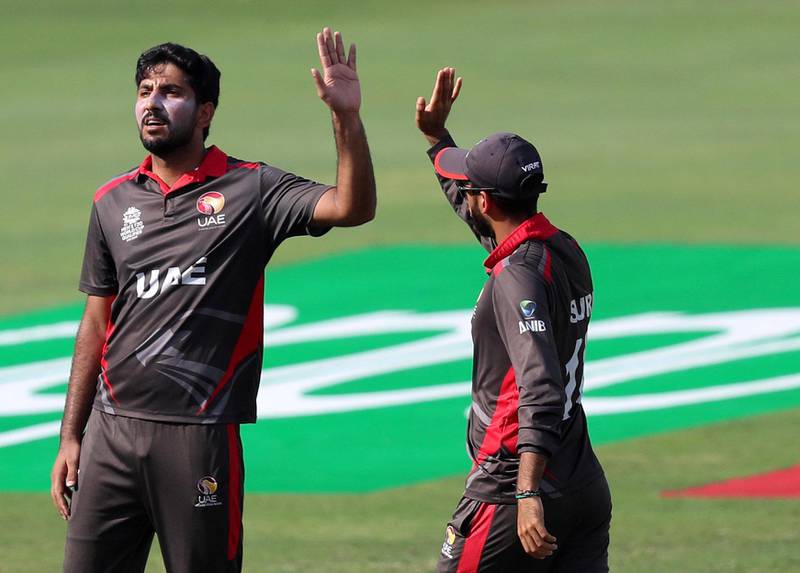 Dubai, United Arab Emirates - October 30, 2019: Junaid Siddique of the UAE takes the wicket of Kyle Coetzer of Scotland during the game between the UAE and Scotland in the World Cup Qualifier in the Dubai International Cricket Stadium. Wednesday the 30th of October 2019. Sports City, Dubai. Chris Whiteoak / The National
