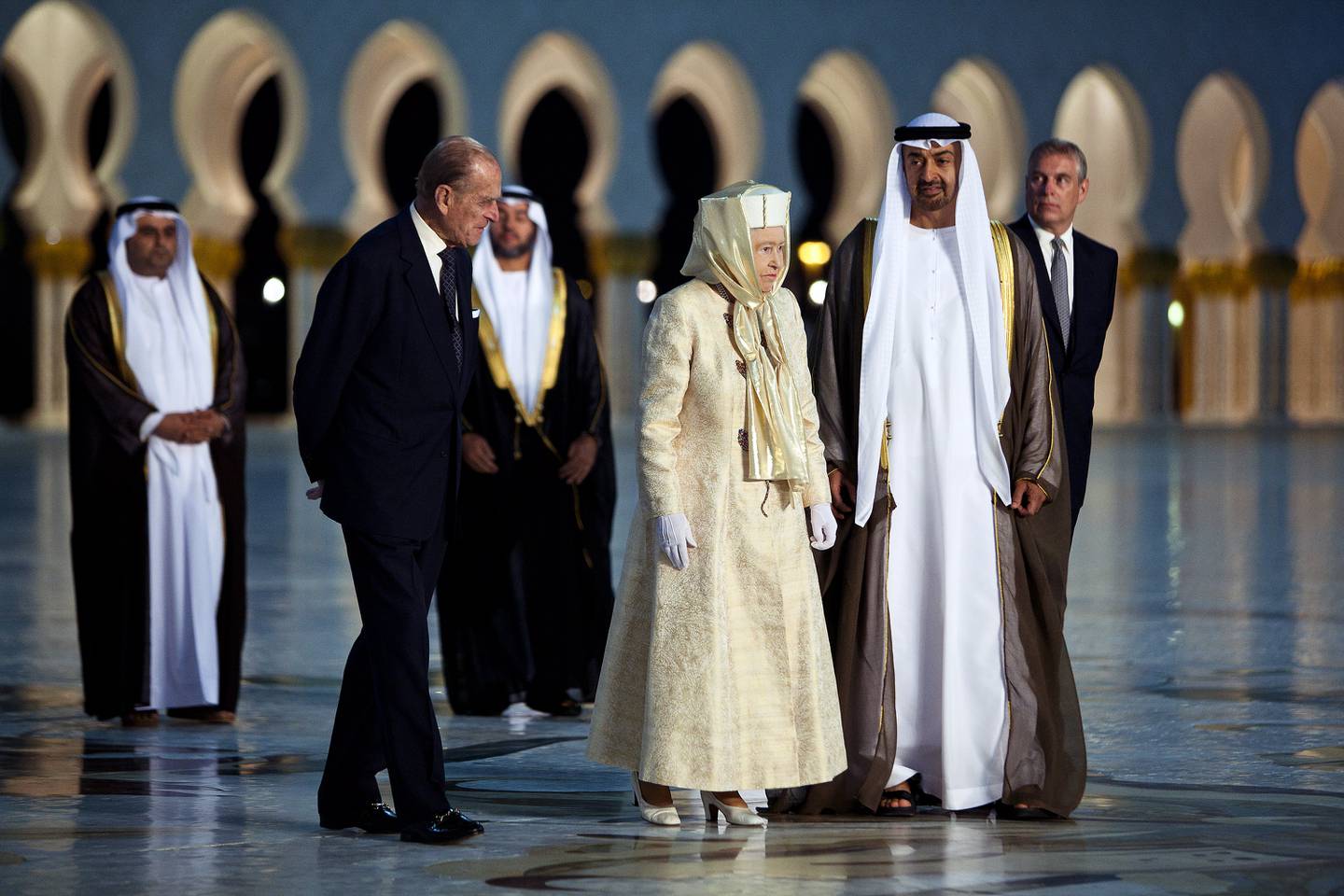 Queen Elizabeth II and her husband Prince Philip, the Duke of Edinburgh, arrive at Sheikh Zayed Grand Mosque with Sheikh Mohamed bin Zayed, Crown Prince of Abu Dhabi at the time, and Prince Andrew, the Duke of York, in November  2010. Andrew Henderson / The National