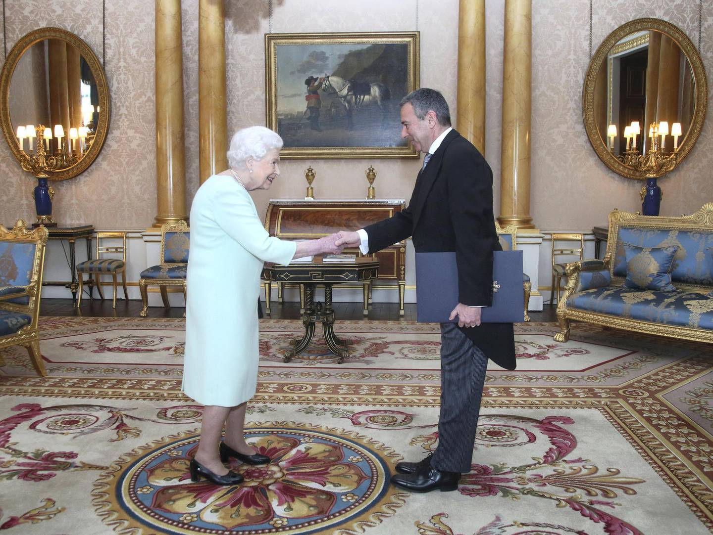 LONDON, UNITED KINGDOM - MARCH 27: His Excellency Tarek Adel is received by Queen Elizabeth II during an audience, when he presented the Letters of Recall of his predecessor and his own Letters of Credence as Ambassador from the Arab Republic of Egypt at Buckingham Palace on March 27, 2019 in London, United Kingdom. (Photo by Yui Mok ‚Äì WPA Pool/Getty Images)
