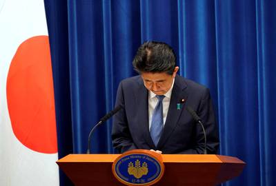 Shinzo Abe bows after stepping down as Japan's Prime Minister in Tokyo. Reuters