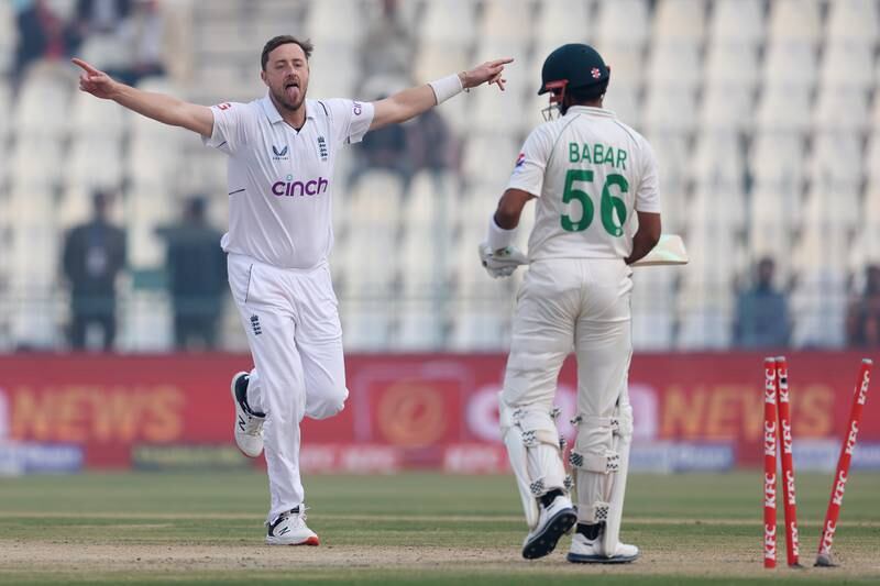 England's Ollie Robinson celebrates after bowling Babar Azam of Pakistan. Getty