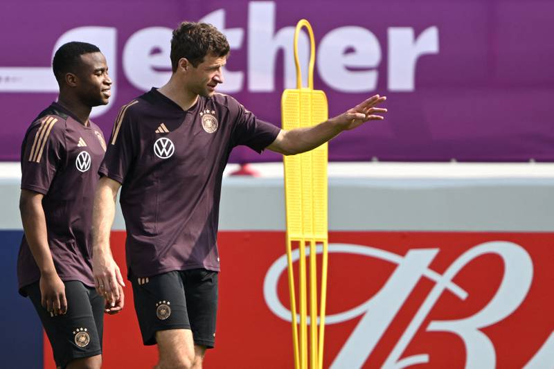 Germany's Thomas Muller and Youssoufa Moukoko attend a training session at the Al Shamal Stadium in Qatar. AFP