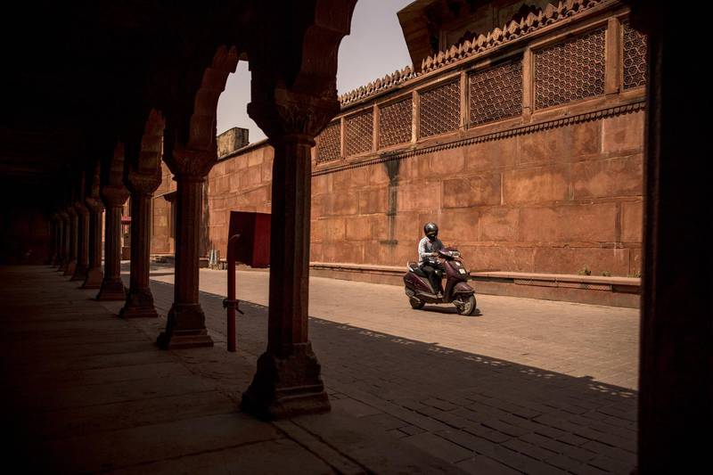 An empty street near an entry gate to the Taj Mahal during a lockdown in Agra, Uttar Pradesh, northern India. Indian consumer confidence is hitting lows, adding to harsh economic data during the world's worst coronavirus outbreak. Bloomberg