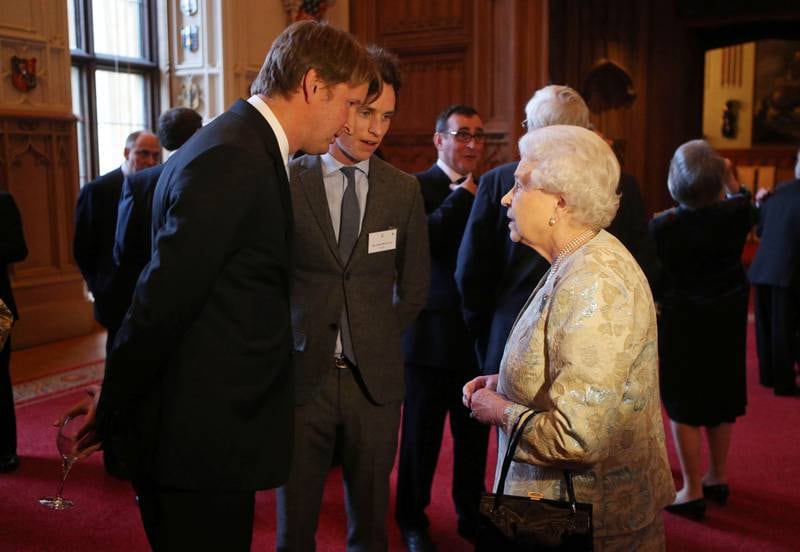 Queen Elizabeth meets Oscar-winning actor Eddie Redmayne at Windsor Castle in 2013. Getty Images