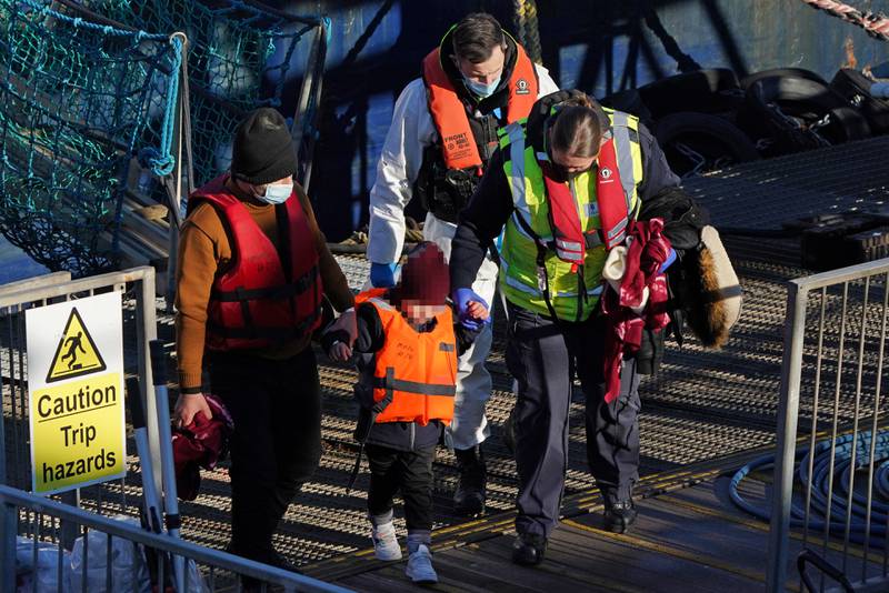 A young child was among the migrants who arrived in the UK on small boats on Thursday. PA
