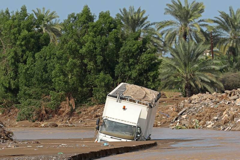 A vehicle is trapped by floodwater after the tropical Cyclone Shaheen in Al Khaburah city in Al Batinah on October 4, 2021. AFP