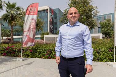Alan May has been staying at the Radisson Red Dubai Silicon Oasis for the past six months and has no urge to experience the formalities of leasing his own home. Photo: Antonie Robertson / The National