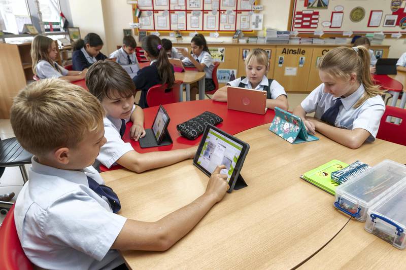 DUBAI, UNITED ARAB EMIRATES. 24 MAY 2018. Students at the Kings School in Al Barsha uses the Pobble app on ipads during a class at school. On the left is Benjamin van den Bosch (12) and Kyle Shackleton (11). (Photo: Antonie Robertson/The National) Journalist: Anam Rizvi. Section: National.