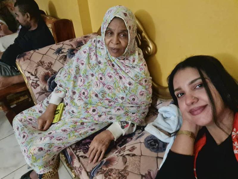 Ms Mustafa with her late mother-in-law back in Sudan right after she learnt she was expecting twins.