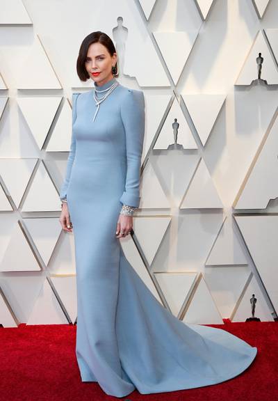 epa07394601 Charlize Theron arrives for the 91st annual Academy Awards ceremony at the Dolby Theatre in Hollywood, California, USA, 24 February 2019. Blue dress by Dior Haute Couture, Serpenti design jewels by Bulgari. The Oscars are presented for outstanding individual or collective efforts in 24 categories in filmmaking.  EPA-EFE/ETIENNE LAURENT