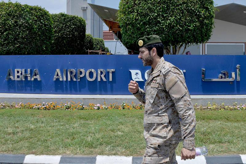 (FILES) This file photo taken taken during a guided tour with the Saudi military on June 13, 2019 shows the welcoming sign at Abha Airport in the popular mountain resort of the same name in the southwest of Saudi Arabia. A Yemeni rebel attack on a civilian airport in southern Saudi Arabia killed a Syrian national and wounded seven civilians on June 23, 2019, a Riyadh-led coalition said, the latest in a series of strikes on the site.
 / AFP / Fayez Nureldine
