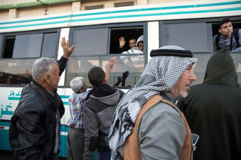 Palestinians bid farewell to family members aboard a bus in  Khan Younis as they leave to travel to the Rafa crossing  to Egypt.For most Palestinians, exit through the Erez crossing to Israel is still basically impossible, but currently the Rafah crossing to Egypt is open. People are rushing to pass before it closes again. In March, 690 people left Gaza via Rafah; after restrictions were loosened in May, in the months since that number has shot up to ranges from 6,000 to over 8,700 people monthly, according to a United Nations report released in October.

 