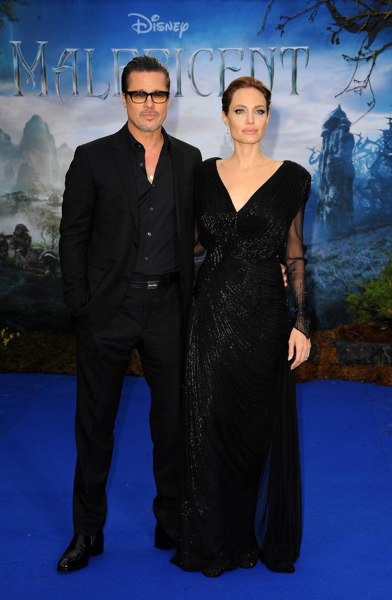 LONDON, ENGLAND - MAY 08:  Brad Pitt and Angelina Jolie attend a private reception as costumes and props from Disney's "Maleficent" are exhibited in support of Great Ormond Street Hospital at Kensington Palace on May 8, 2014 in London, England.  (Photo by Eamonn M. McCormack/Getty Images)