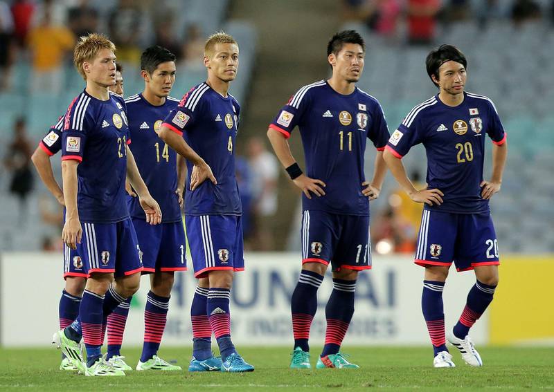 SYDNEY, AUSTRALIA - JANUARY 23:  Japan players look dejected after losing the penalty shoot out during the 2015 Asian Cup Quarter Final match between Japan and the United Arab Emirates at ANZ Stadium on January 23, 2015 in Sydney, Australia.  (Photo by Mark Metcalfe/Getty Images)