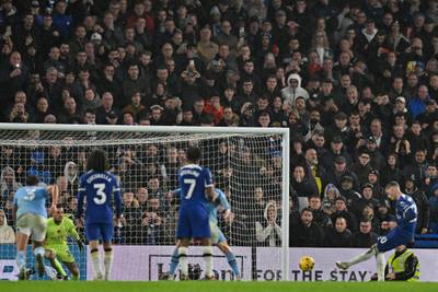 Chelsea's Cole Palmer scores their fourth goal from the penalty spot. AFP