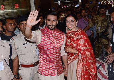 Fans and photographers greeted the newlyweds at Mumbai International Airport early on November 18, 2018. AFP