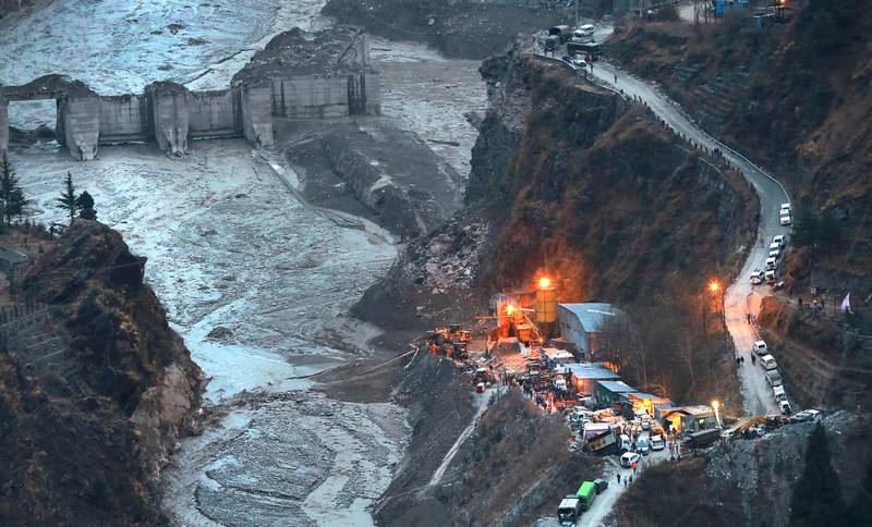 A aerial view of Tapovan barrage two days after a portion of the Nanda Devi glacier snapped off, releasing water trapped behind it in Tapovan, northern state of Uttarakhand, India, Tuesday, Feb.9, 2021. Scientists are investigating what caused the glacier to break â€” possibly an avalanche or a release of accumulated water. Experts say climate change may be to blame since warming temperatures are shrinking glaciers and making them unstable worldwide. (AP Photo)
