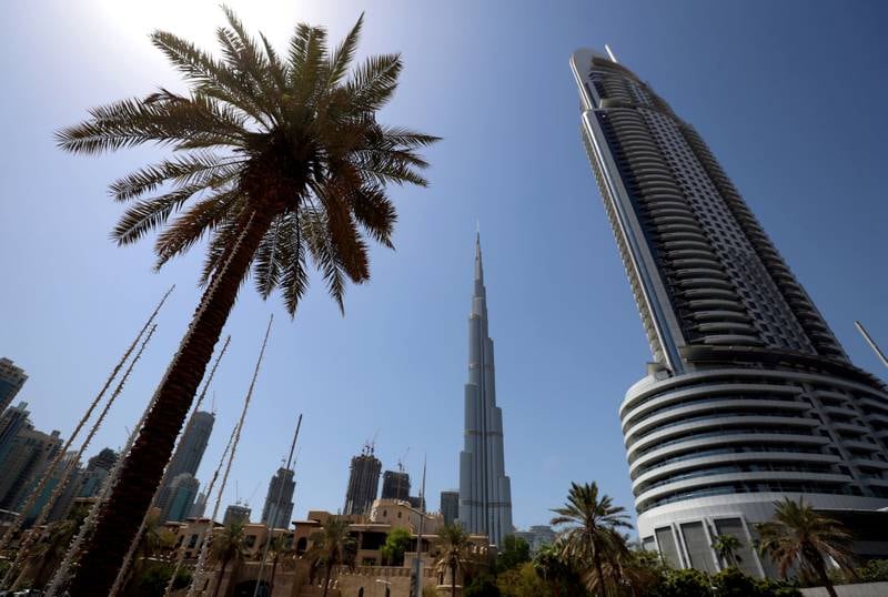 Dubai, United Arab Emirates - Reporter: N/A. Standalone. Stock. General view of Downtown with a plan tree the Burj Khalifa and the Address hotel. Saturday, September 5th, 2020. Dubai. Chris Whiteoak / The National