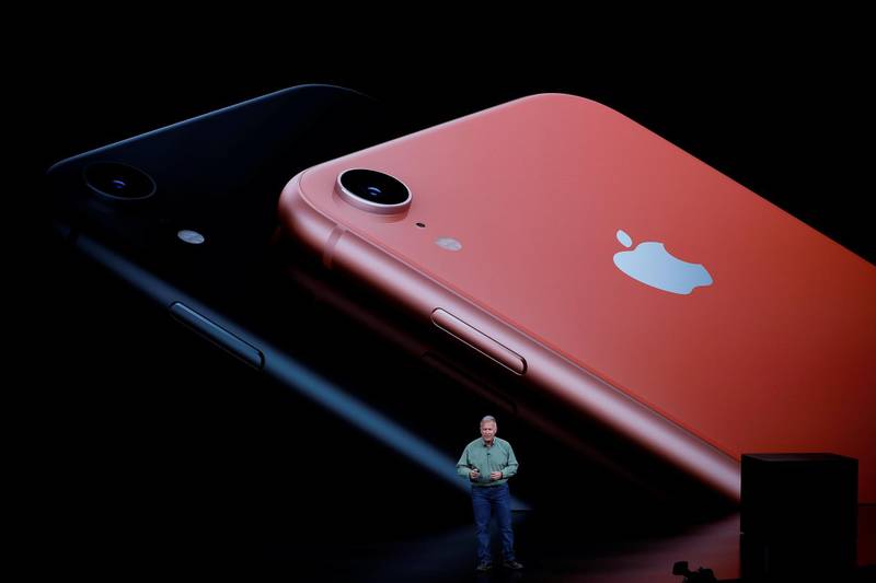 FILE PHOTO: Philip W. Schiller, Senior Vice President, Worldwide Marketing of Apple, speaks about the new Apple iPhone XR at an Apple Inc product launch event at the Steve Jobs Theater in Cupertino, California, U.S., September 12, 2018. REUTERS/Stephen Lam/File Photo