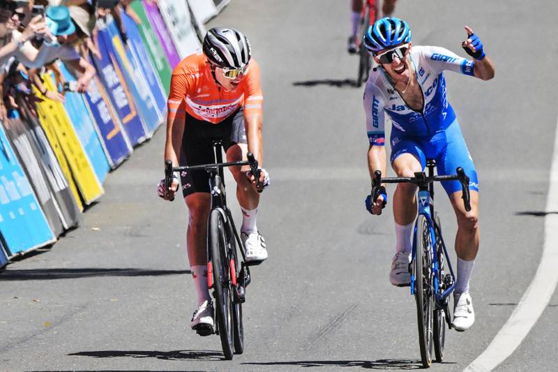 Simon Yates celebrates winning the final stage of the Tour Down Under as Jay Vine places second to win the title. AFP