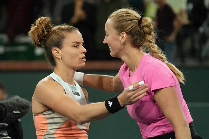Maria Sakkari and Petra Kvitova greet at the net after their match in the Indian Wells quarter-finals. AP