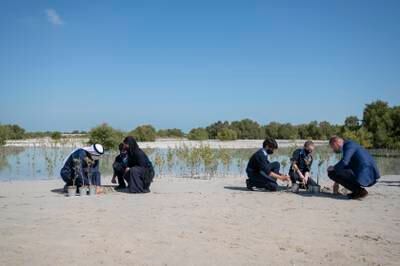 Sheikh Khaled bin Mohamed with Prince William and pupils at Jubail Mangrove Park. Photo: Abu Dhabi Media Office