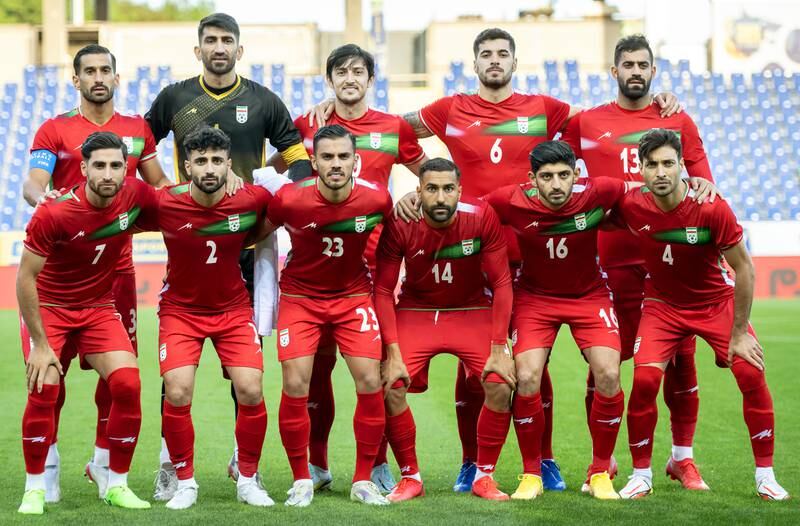 Iran's number 14 Saman Ghoddos, front row third from right, with his Iranian teammates before a World Cup warm-up game against Austria. EPA
