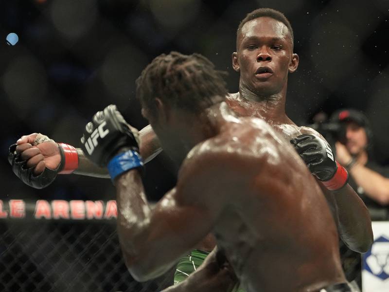 Israel Adesanya and Jared Cannonier during their middleweight bout at UFC 276. Reuters