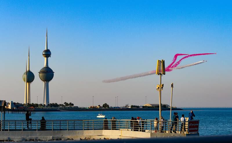 The Red Arrows perform a fly-over in Kuwait city on Monday. EPA