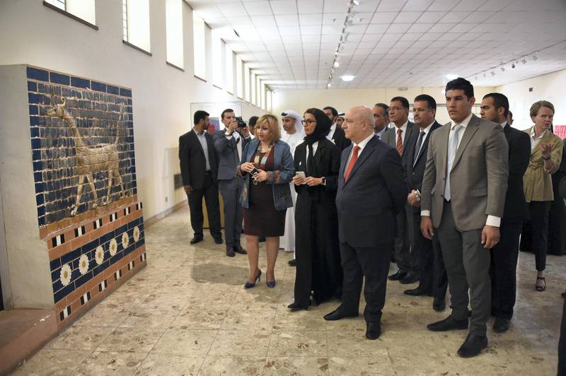 Minister of Culture and Knowledge Development Noura Al Kaabi  and Iraqi Minister of Culture Feriad Rawandouzi, standing to her left, tour the Iraq Museum in Baghdad. Wam