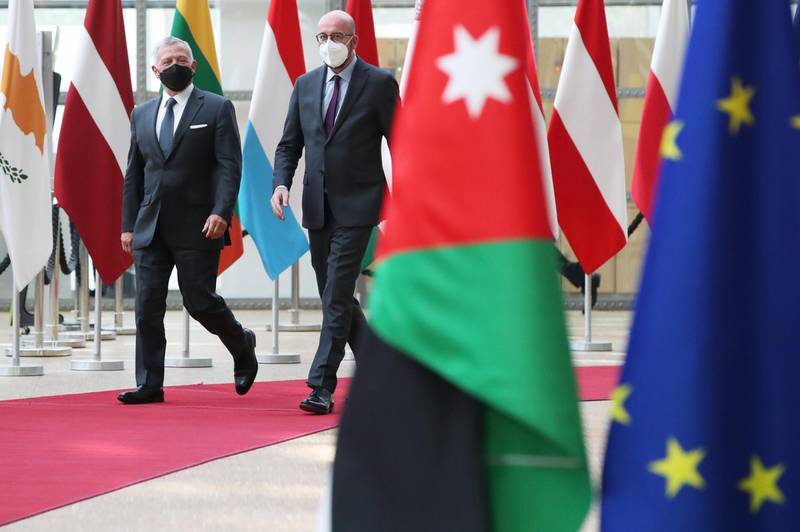 King Abdullah is welcomed by European Council President Charles Michel in Brussels. EPA