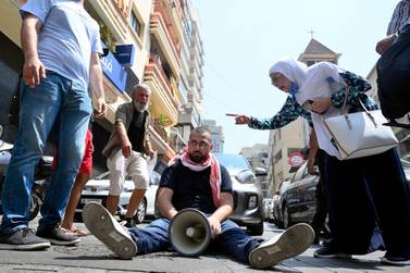 Anti-government protesters block a street after the Lebanese Ali Mohammad Al Haq, 61, shot himself in the head at Hamra street in Beirut, Lebanon, July 3, 2020. According to media reports, Al-Haq shot himself dead due to the economic and social situation in Lebanon. EPA