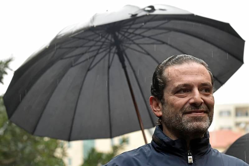Former Lebanese prime minister Saad Hariri greets supporters during a rally outside his house in downtown Beirut. EPA