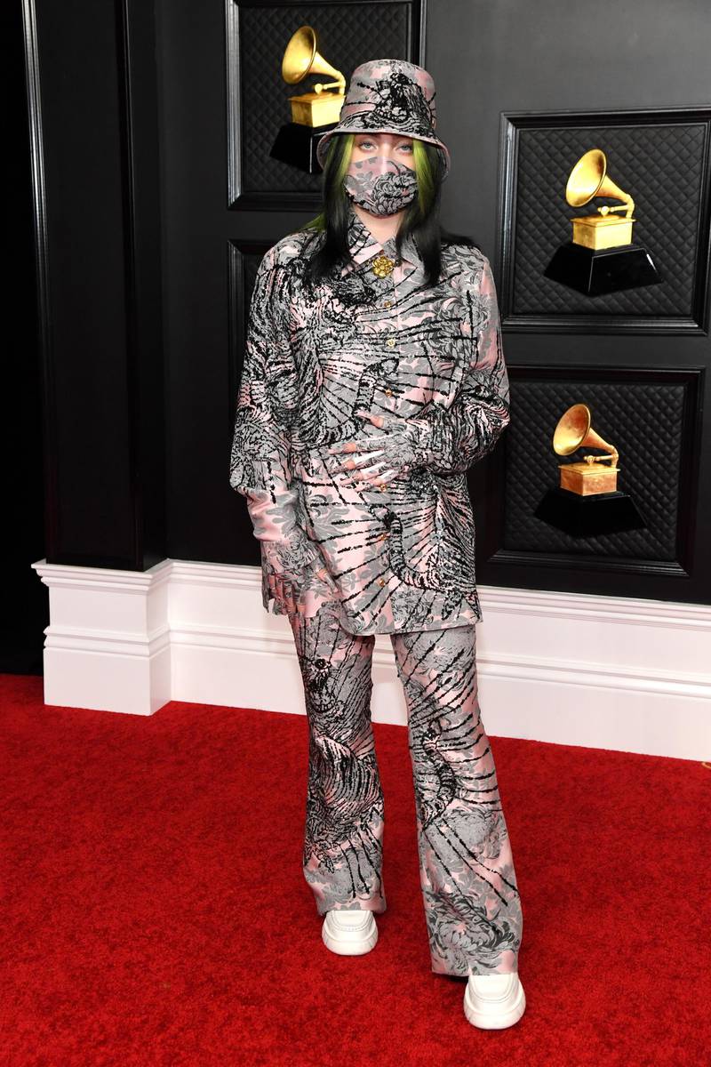 Multiple Grammy nominee Billie Eilish wore a pink Gucci outfit with black sequins and matching gloves, hat and mask. EPA