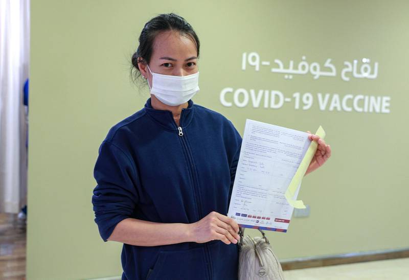 Abu Dhabi, United Arab Emirates, December 13, 2020.     Bunyanuch Janta, from Thailand waits for her turn to get vaccinated at the clinic.Victor Besa/The NationalSection:  NA