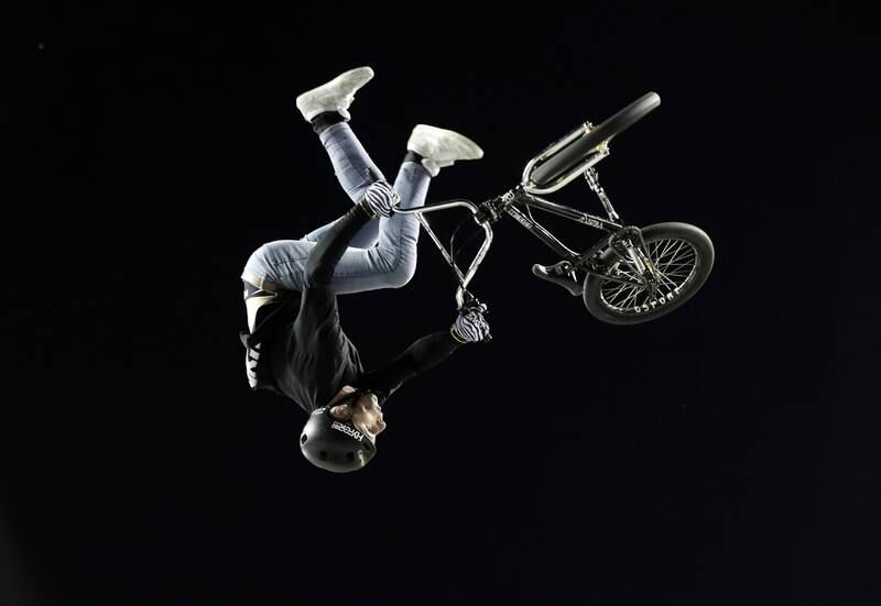 A cyclist performs stunts in an extreme sports exhibition during the Xknights event, in San Jose, Costa Rica. EPA