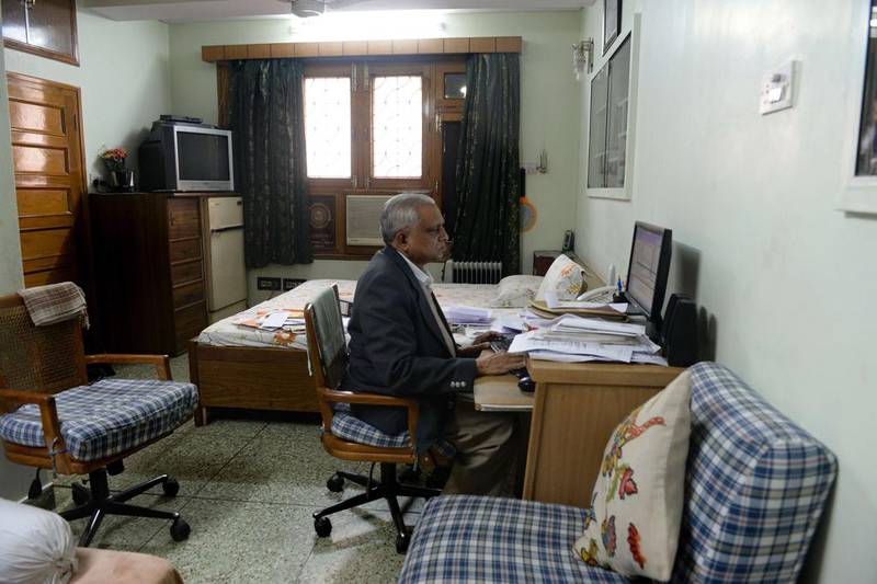 India's most tireless corruption fighter Subhash Agrawal works at a computer in his home in the old quarters of New Delhi. AFP 

