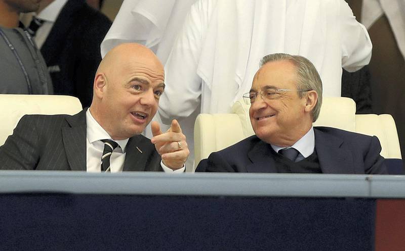 Abu Dhabi, United Arab Emirates - December 22, 2018: Madrid president. Fiorentino Perez (R) and FIFA president Gianni Infantino before the match between Real Madrid and Al Ain at the Fifa Club World Cup final. Saturday the 22nd of December 2018 at the Zayed Sports City Stadium, Abu Dhabi. Chris Whiteoak / The National
