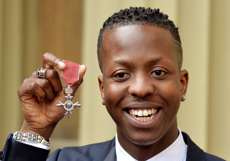 British music entrepreneur Jamal Edwards, pictured above holding his MBE award, has died at the age of 31. PA