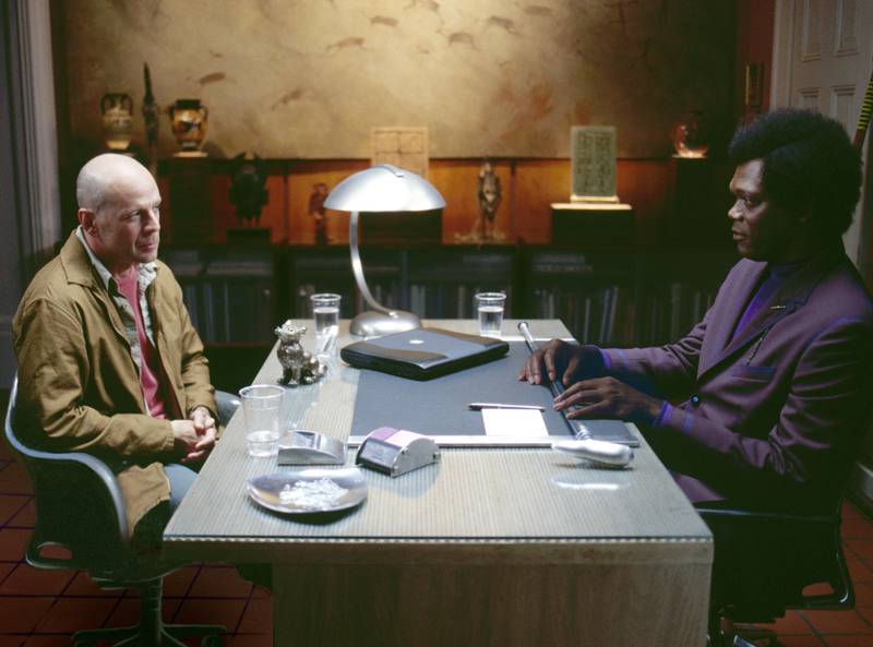 A handout movie still of Bruce Willis and Samuel L. Jackson in "Unbreakable" (Courtesy: Touchstone Pictures) NOTE: For Chris Newbould's feature about film sequels *** Local Caption ***  unbreakable_56e8b3b7.jpg