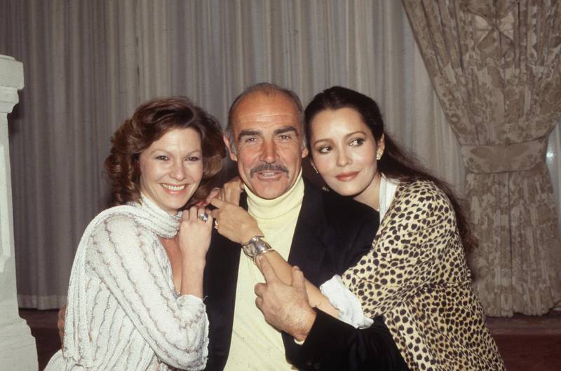 1983:  From left to right, Pamela Salem who appears as Miss Moneypenny in 'Never Say Never Again', Sean Connery who plays James Bond and Barbara Carrera who plays Fatima Blush.  (Photo by Hulton Archive/Getty Images)