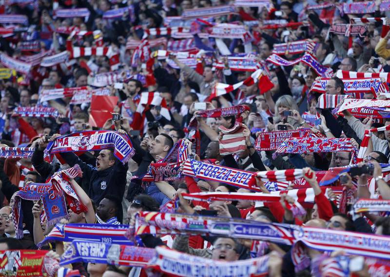 Atletico Madrid fans show their support ahead of the Champions League match against Chelsea on Tuesday. Andres Kudacki / AP / April 22, 2014