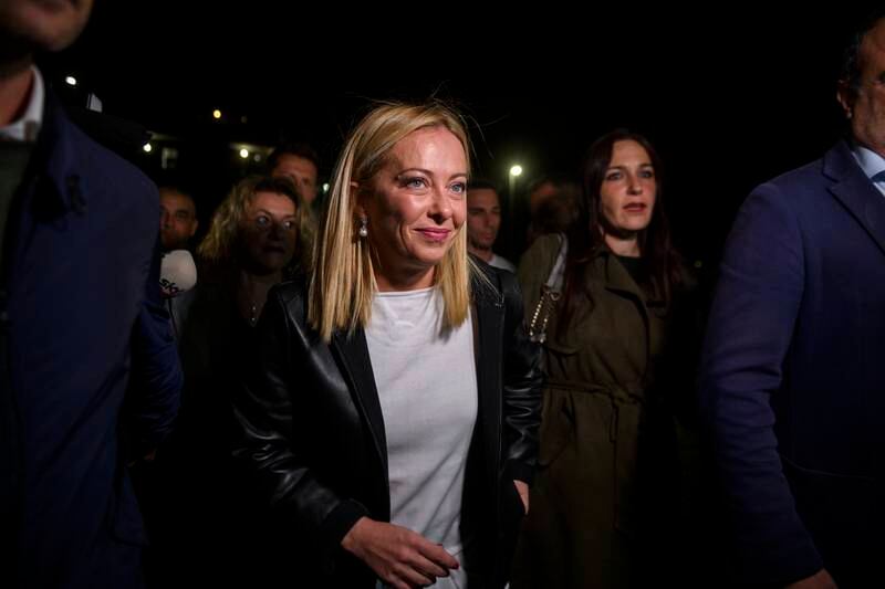 Giorgia Meloni, leader of the Brothers of Italy, arrives to cast her vote for the Italian general election at a polling station in Rome. Getty
