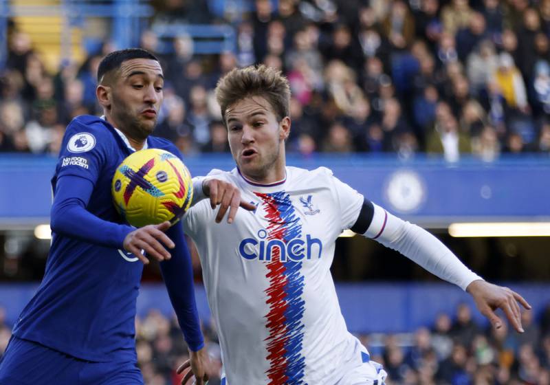 Chelsea's Hakim Ziyech battles for the ball with Crystal Palace's Joachim Andersen. AP
