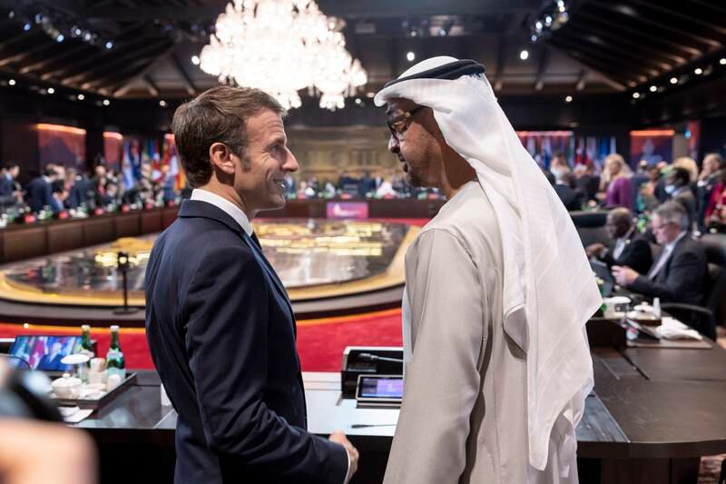 Sheikh Mohamed with French President Emmanuel Macron. 