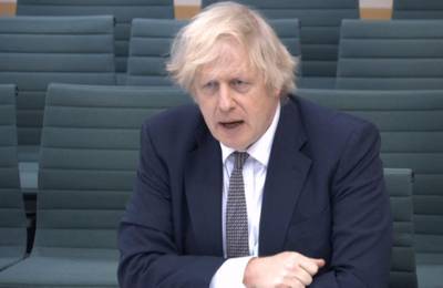 A video grab from footage broadcast by the UK Parliament's Parliamentary Recording Unit (PRU) shows Britain's Prime Minister Boris Johnson giving evidence to the House of Commons Liaison Committee at the Houses of Parliament in London on March 24, 2021.  - RESTRICTED TO EDITORIAL USE - MANDATORY CREDIT " AFP PHOTO / PRU " - NO USE FOR ENTERTAINMENT, SATIRICAL, MARKETING OR ADVERTISING CAMPAIGNS
 / AFP / PRU / - / RESTRICTED TO EDITORIAL USE - MANDATORY CREDIT " AFP PHOTO / PRU " - NO USE FOR ENTERTAINMENT, SATIRICAL, MARKETING OR ADVERTISING CAMPAIGNS
